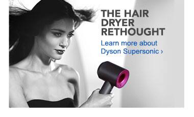 The Hair Dryer Rethought. Learn more about the Dyson Supersonic. Woman with Hair Dryer.