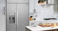 Pacific Kitchen & Home. Designer kitchen with refrigerator and other appliances.