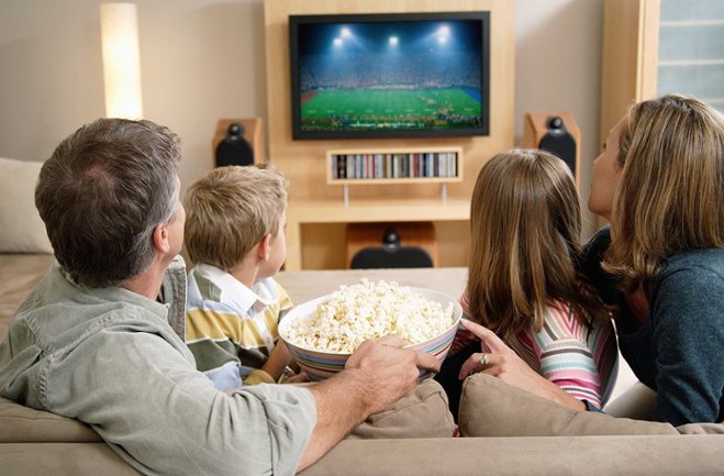 family watching sports on tv