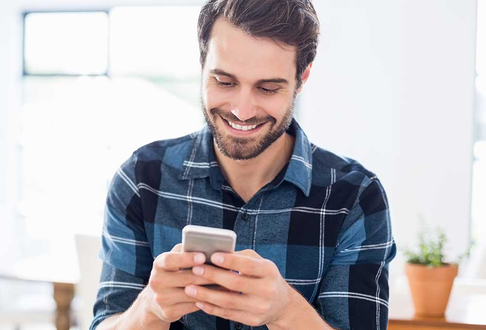 Man holding cell phone