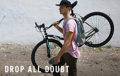 Man carrying bike, drop all doubt