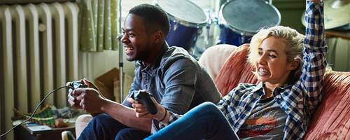 People gaming on PlayStation