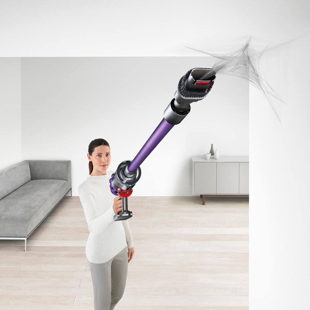 Person cleaning the ceiling