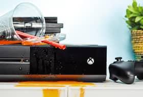 Drink spilling over Xbox One X, Geek Squad