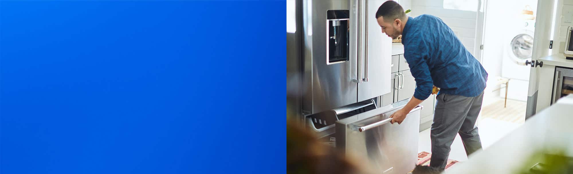 Man opening refrigerator