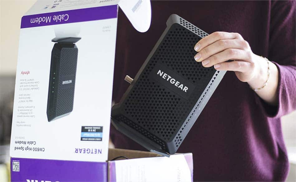 Person taking modem out of box
