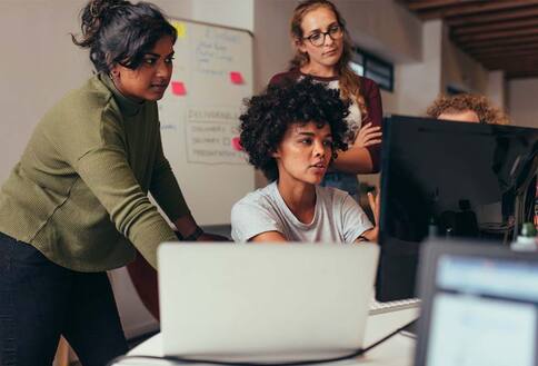 Women looking at computer