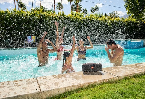 Speaker by a pool