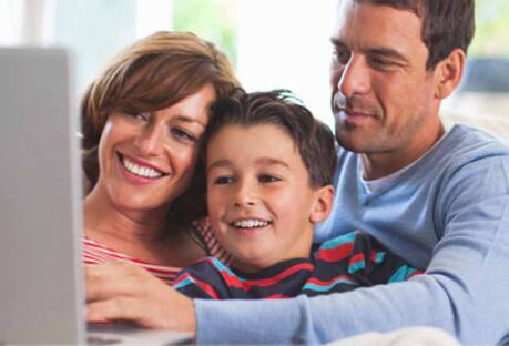 family watching computer