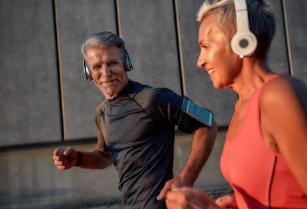People jogging with headphones