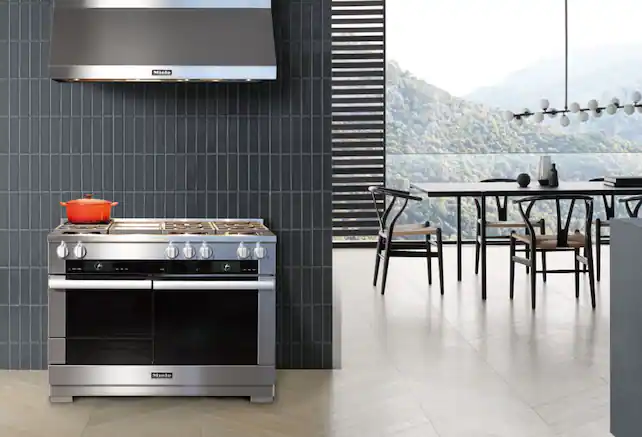 Range and range hood in kitchen