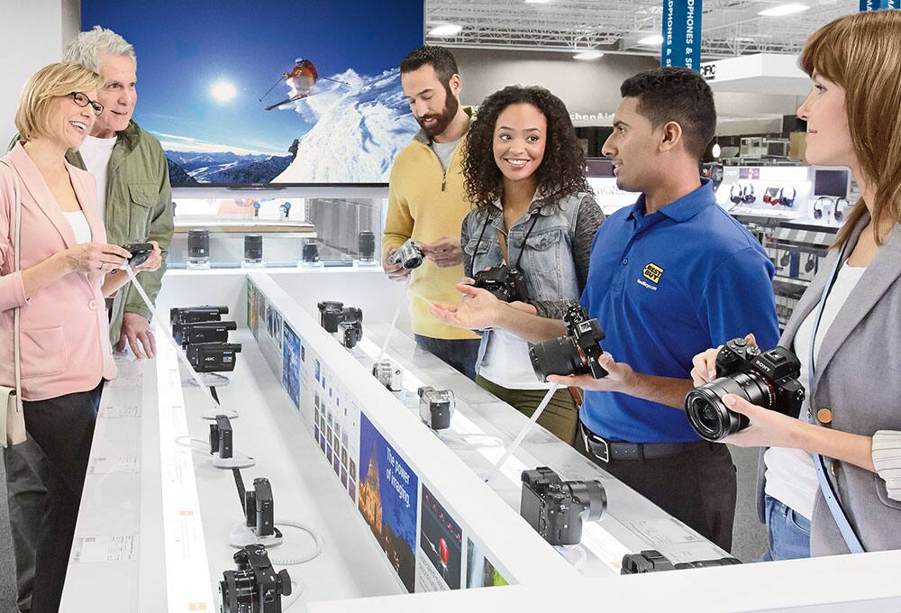 Blue Shirt with customers