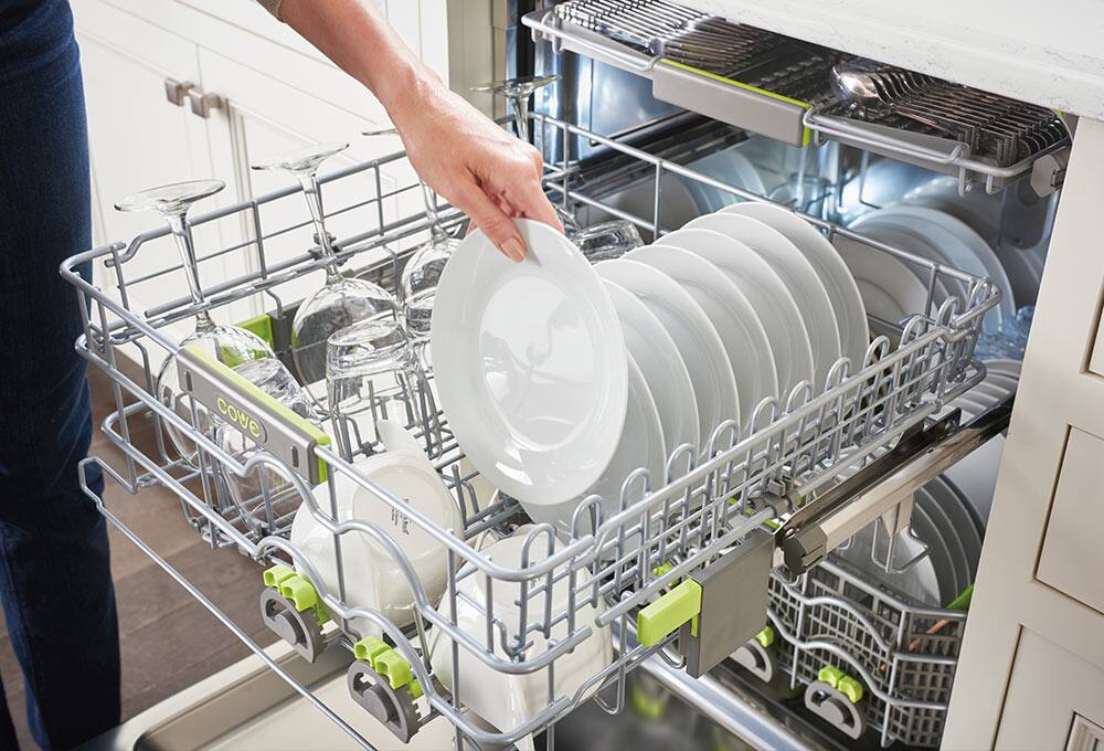 Person unloading dishwasher