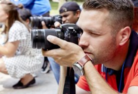 People holding cameras