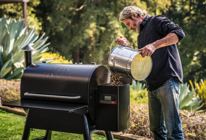 Pellet top grill hopper