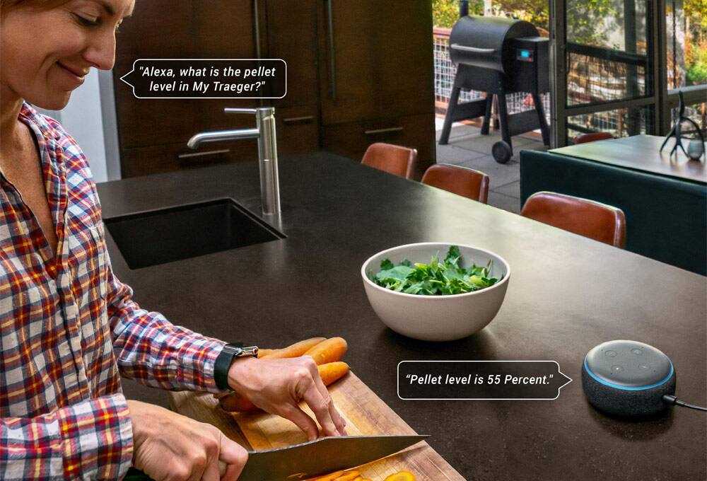 Voice assistant device on table quoted as saying “pellet level is 55 percent.” Works with Google assistant. Works with Alexa.