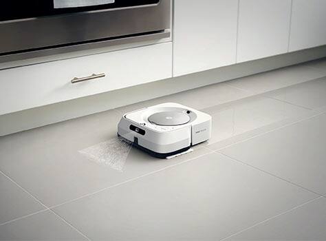 Robot mop cleaning paw prints