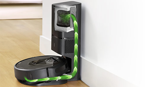 Dirt being transferred from robot vacuum to docking station