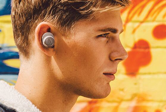 Man wearing true wireless headphones