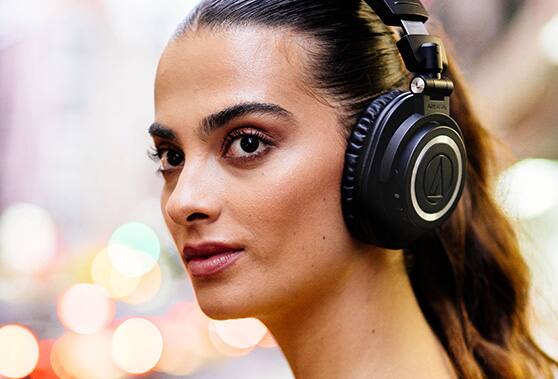 Woman wearing wireless headphones