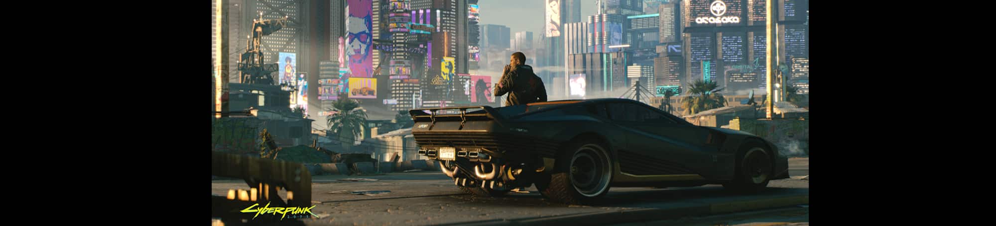 Man leaning on car looking over futuristic landscape