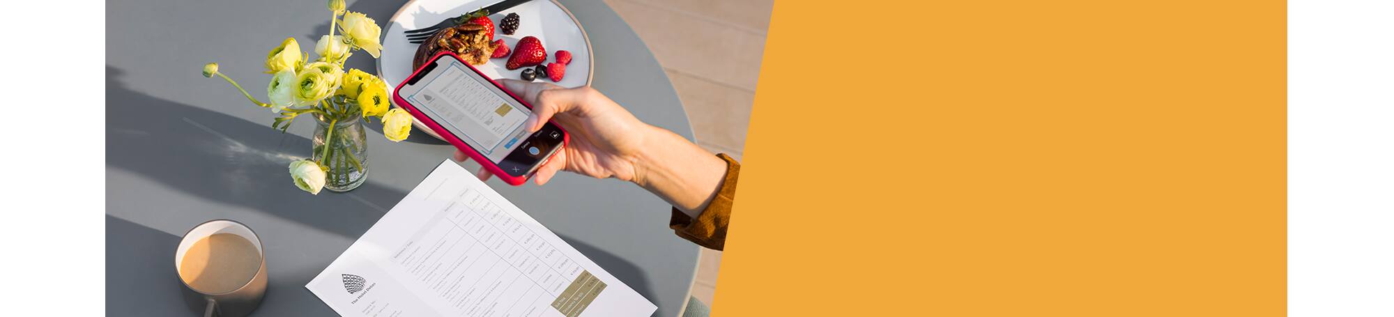 Person taking photo of document using a smartphone