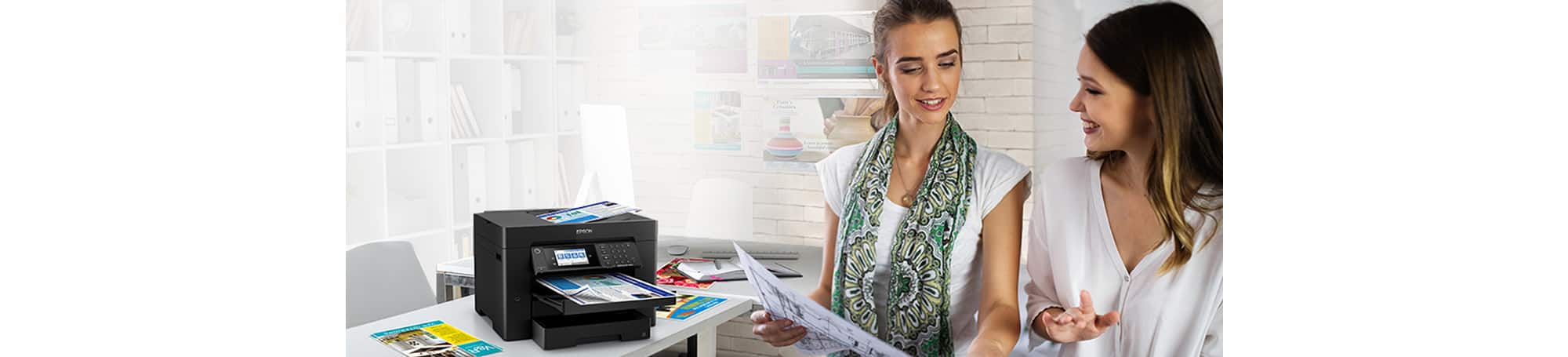 Two women looking over documents