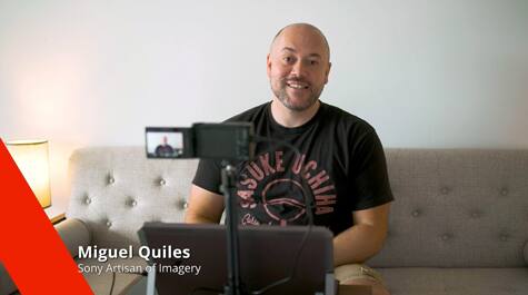Man delivering presentation in front of camera