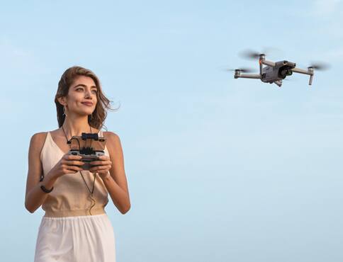 Woman flying a drone