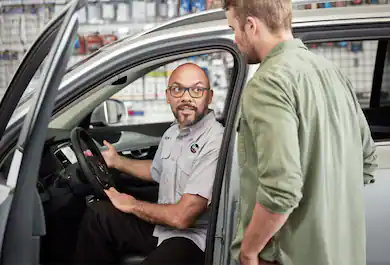 Geek Squad Agent with client.