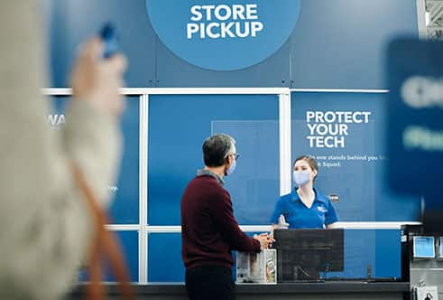 Man talking with Best Buy Blue Shirt