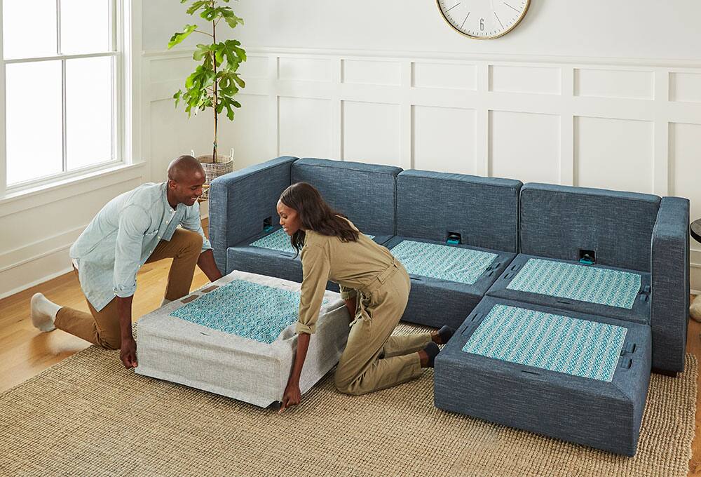 Couple replacing cover on Sactional