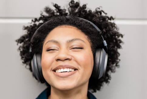 Woman wearing noise cancelling headphones