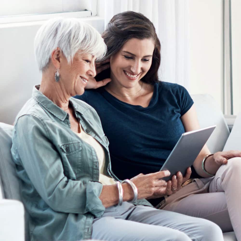 People looking at tablet