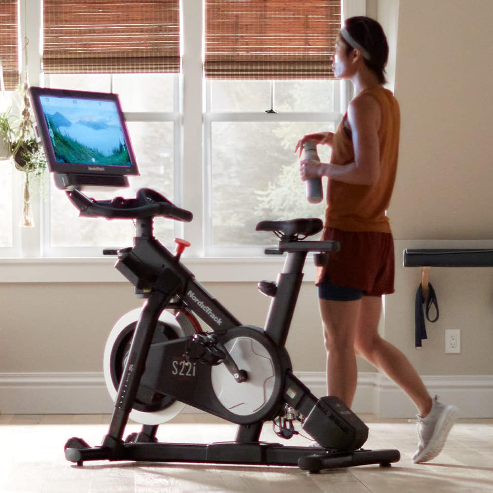 Person using exercise bike