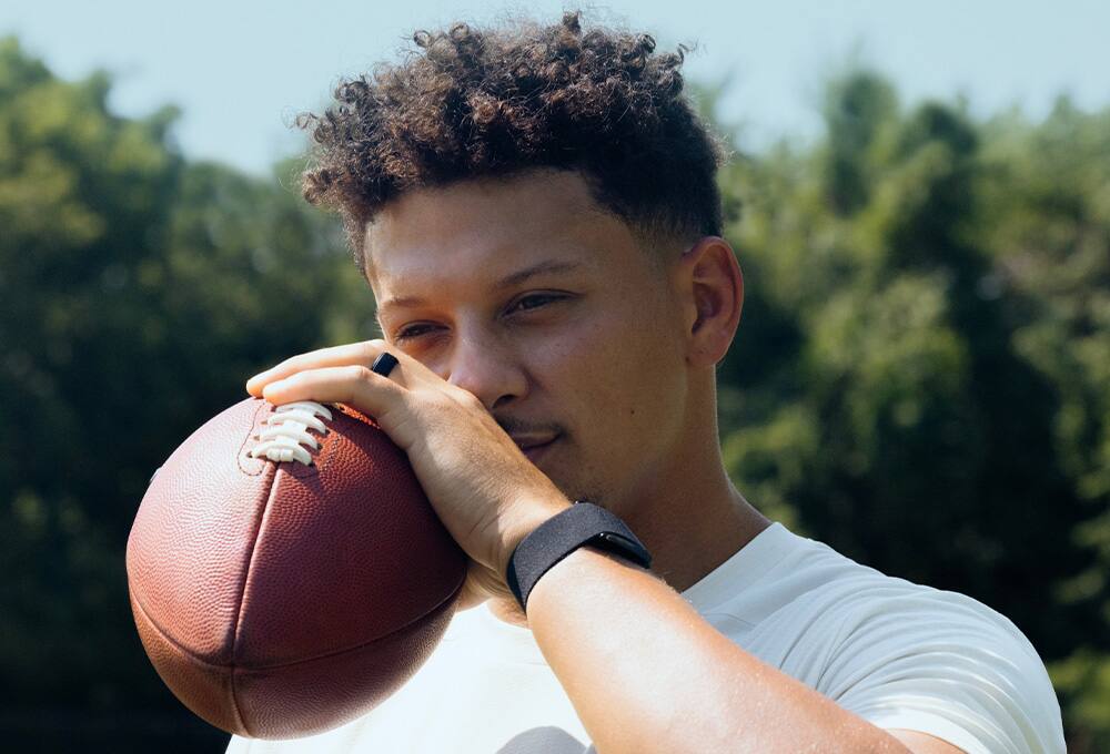 Football player wearing fitness tracker