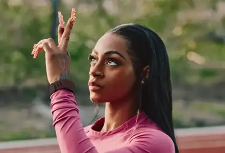 Sprinter wearing fitness tracker