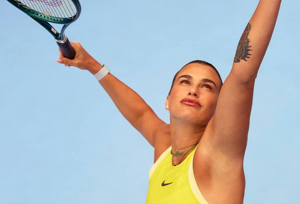 Tennis player wearing fitness tracker