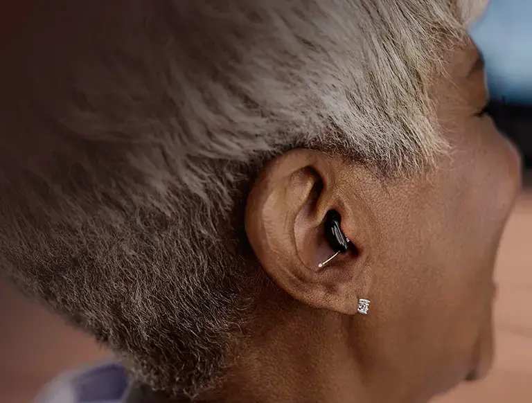 Person wearing hearing aids