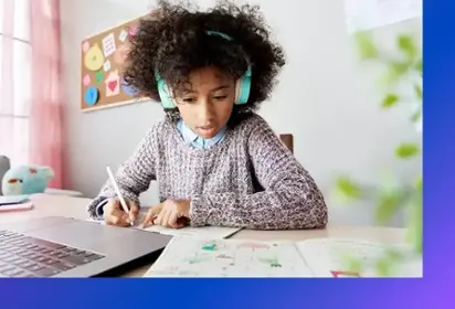 Teen working on laptop
