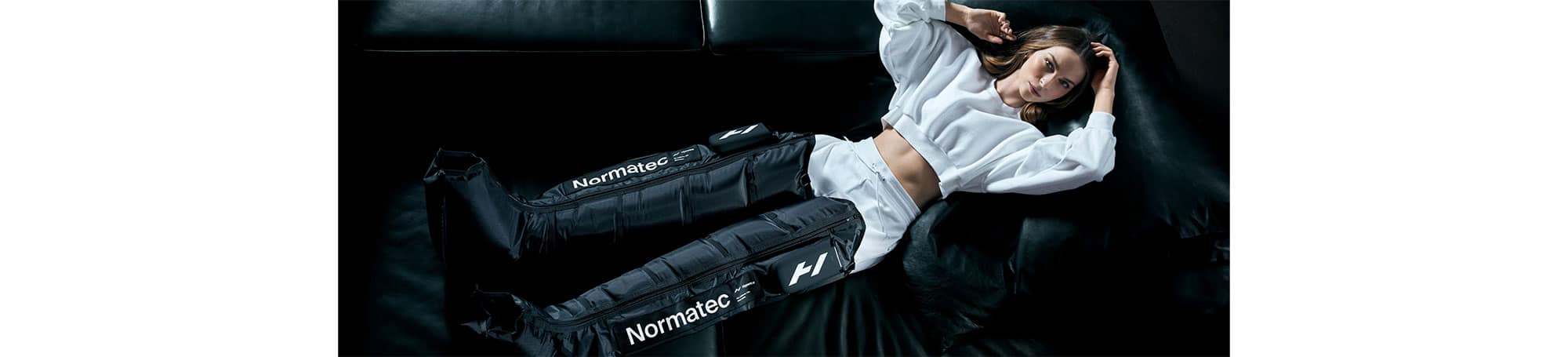 Person using percussion massager