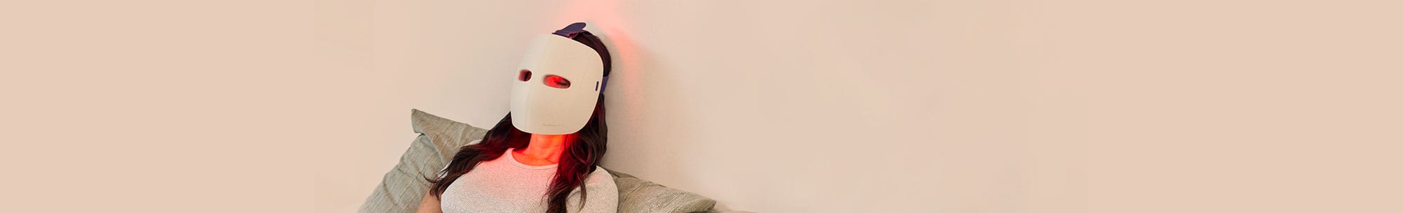 Person wearing LED mask