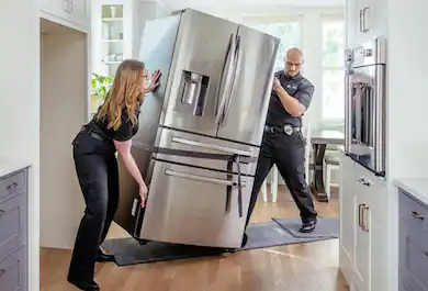 Installing a refrigerator.