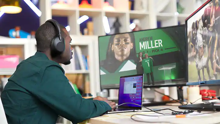 Man watching the NFL draft