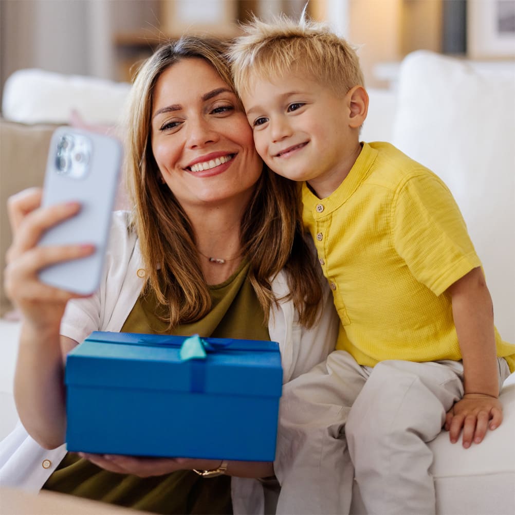 Mom and son taking selfie.
