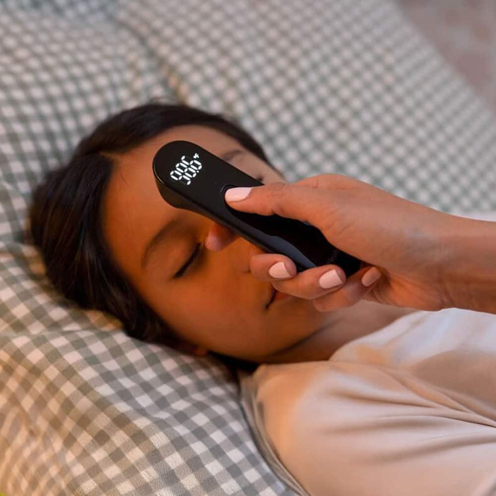 Person using thermometer