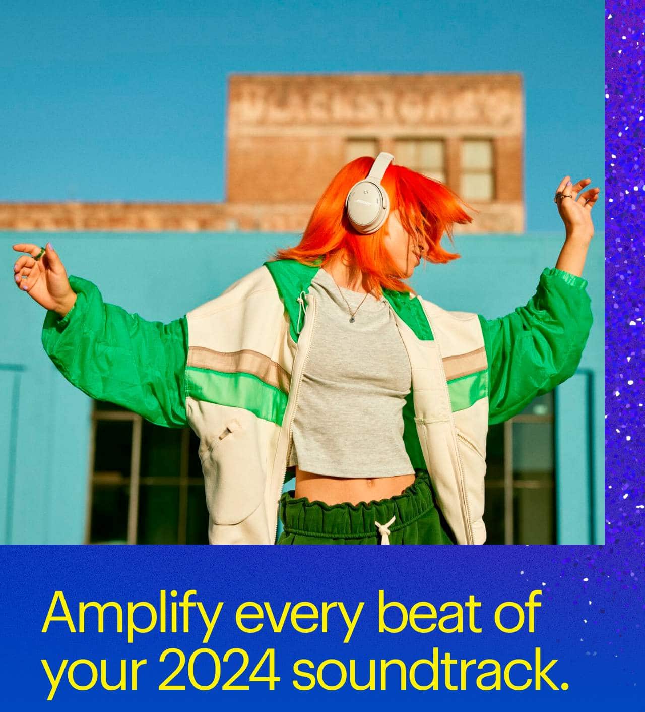 Amplify every beat of your 2024 soundtrack.  Person wearing headphones and dancing.