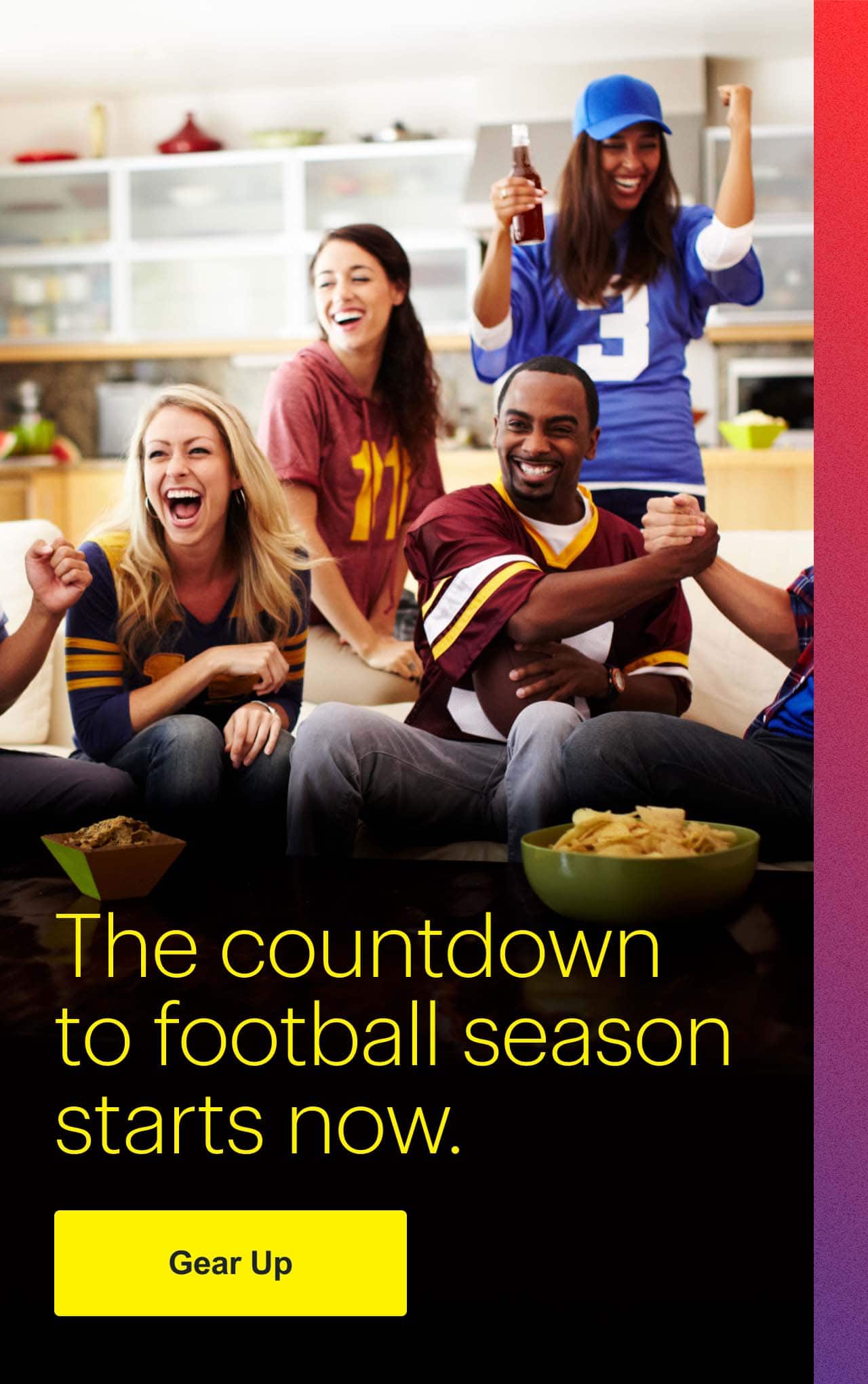 The countdown to football season starts now.  Group of football fans watching a game.