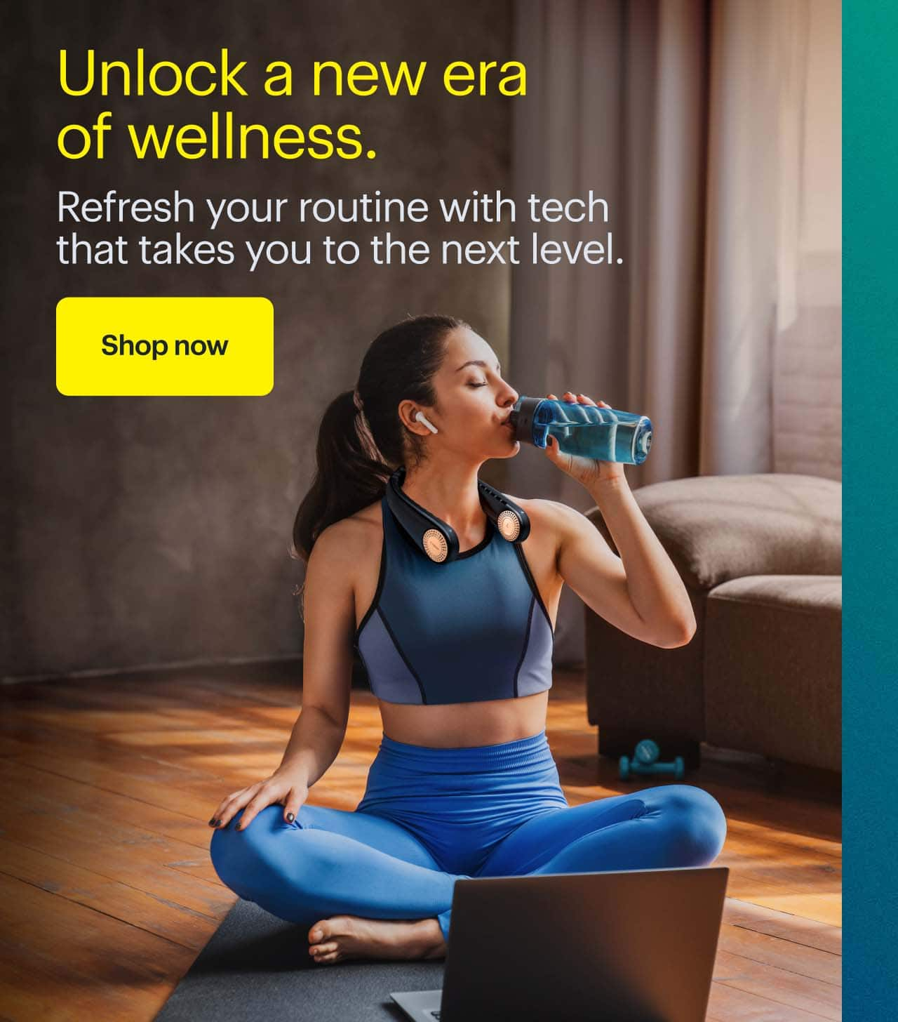 Unlock a new era of wellness.  Person drinking water while sitting on yoga mat in front of laptop.