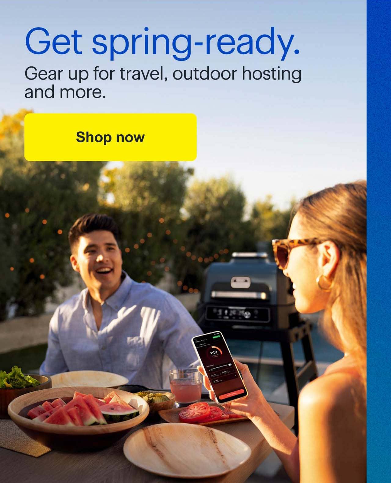Get spring-ready.  Two people sitting on patio grilling with smart grill app.